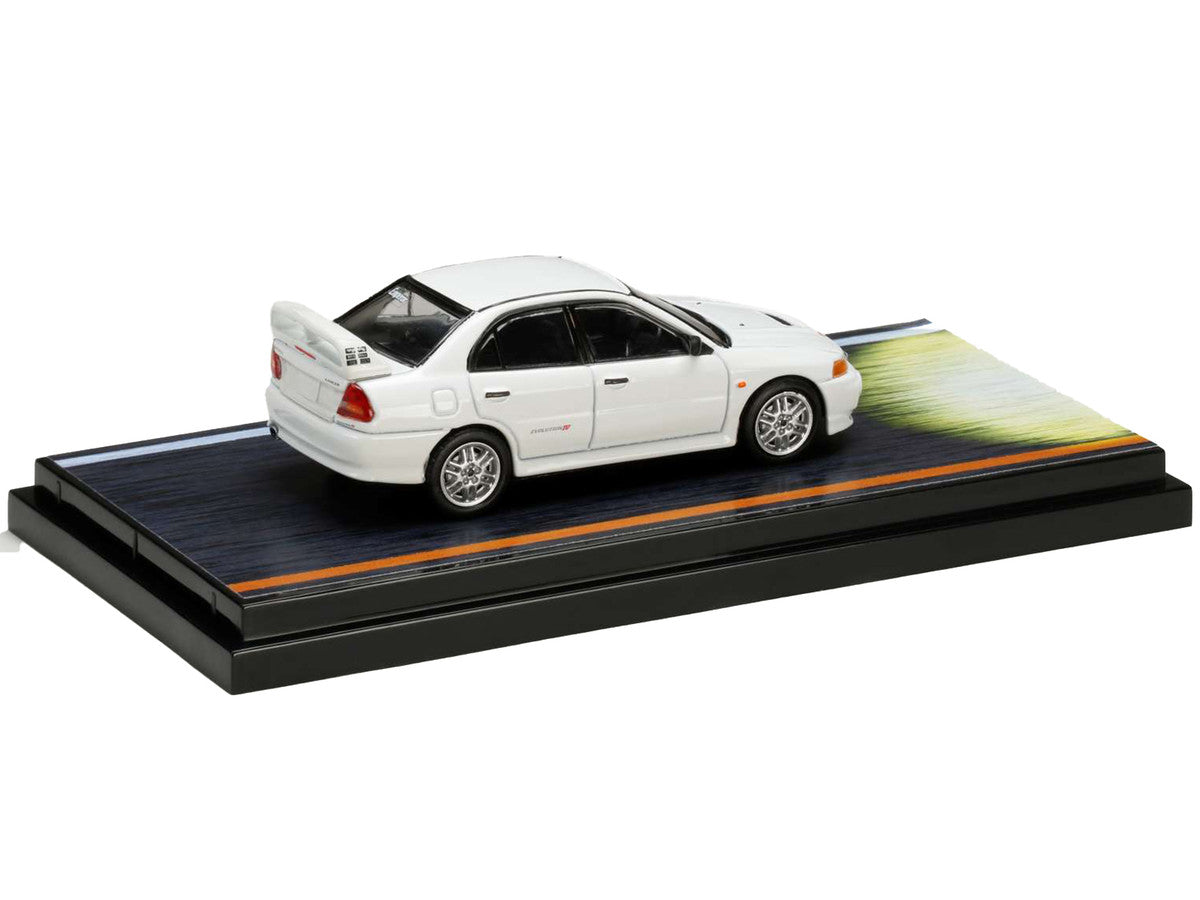Mitsubishi Lancer RS Evolution IV RHD (Right Hand Drive) White "Monstar" with Seiji Iwaki Driver Figure "Initial D" (1995-2013) Manga 1/64 Diecast Model Car by Hobby Japan LuxuryLifeWay Online Store
