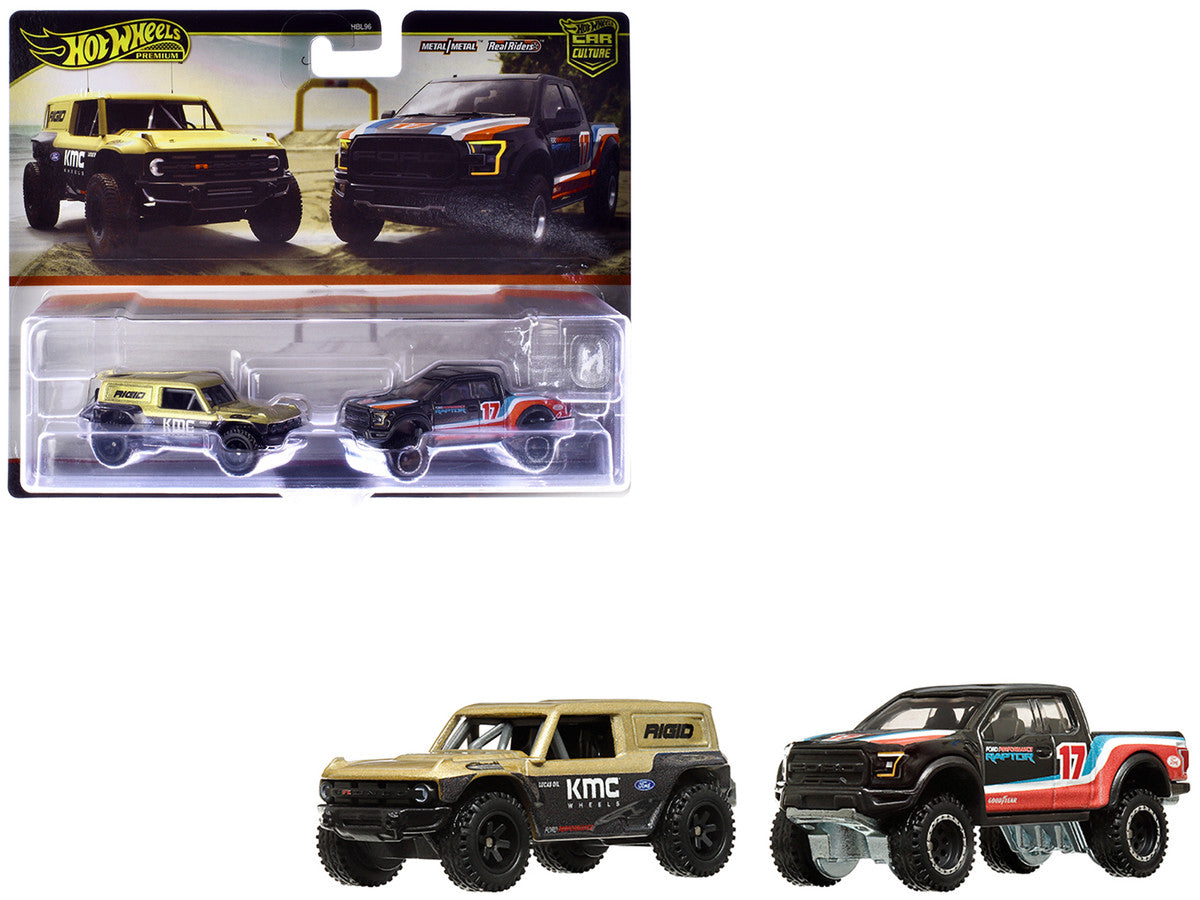 Ford Bronco R Gold Metallic and Black and 2017 Ford F-150 Raptor Pickup Truck #17 Black with Stripes "Car Culture" Set of 2 Cars Diecast Model Cars by Hot Wheels LuxuryLifeWay Online Store