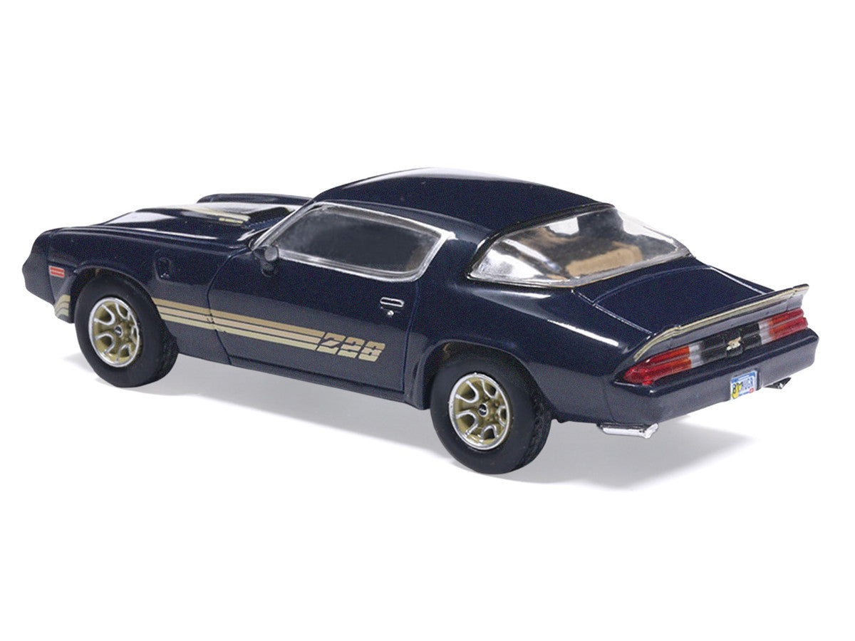1981 Chevrolet Camaro Z28 Dark Blue Metallic with Gold Stripes and Interior 1/64 Diecast Model Car by IXO Models LuxuryLifeWay Online Store