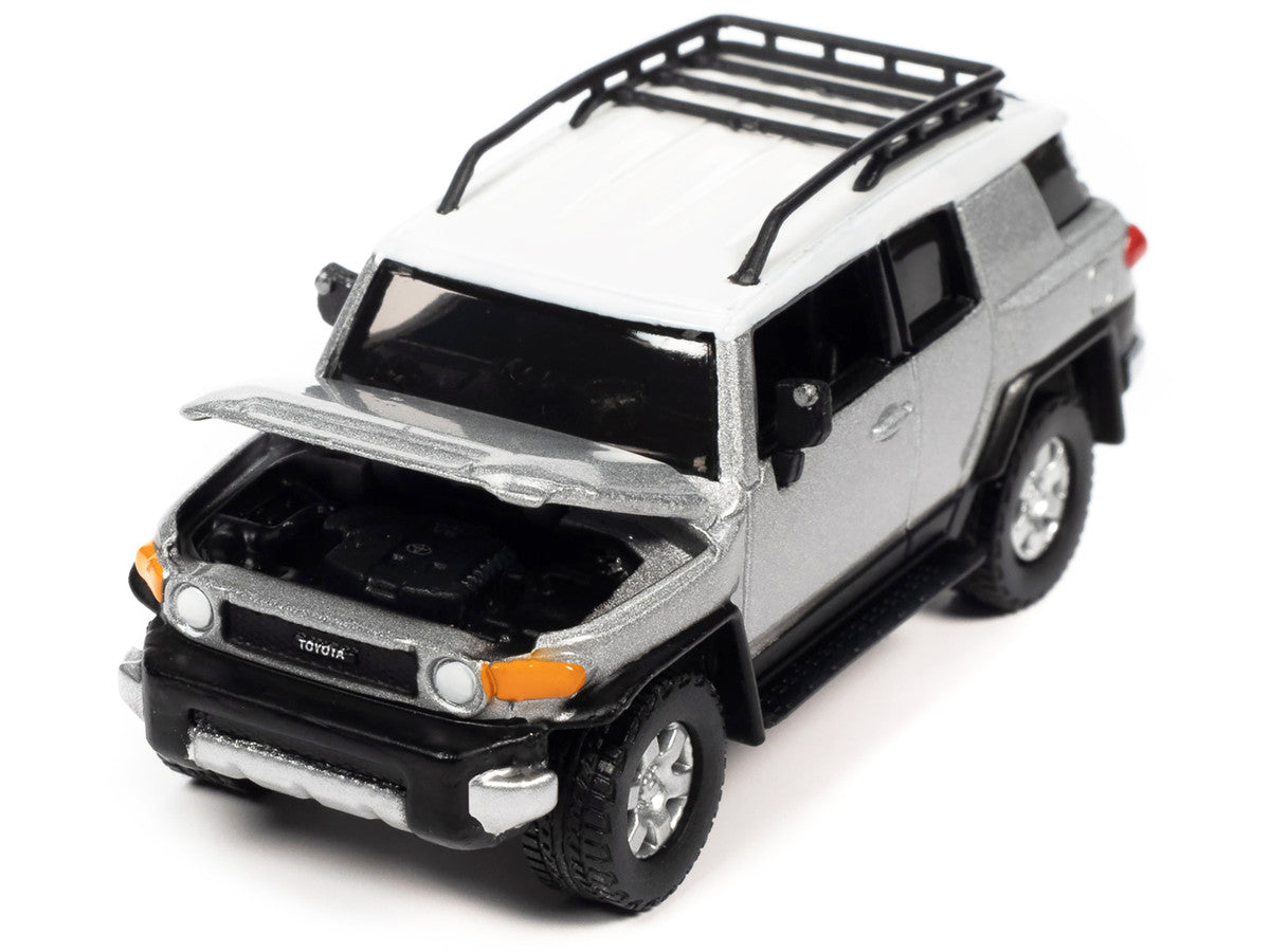 2007 Toyota FJ Cruiser Titanium Silver Metallic with White Top and Roofrack "Classic Gold Collection" Series Limited Edition 1/64 Diecast Model Car by Johnny Lightning LuxuryLifeWay Online Store