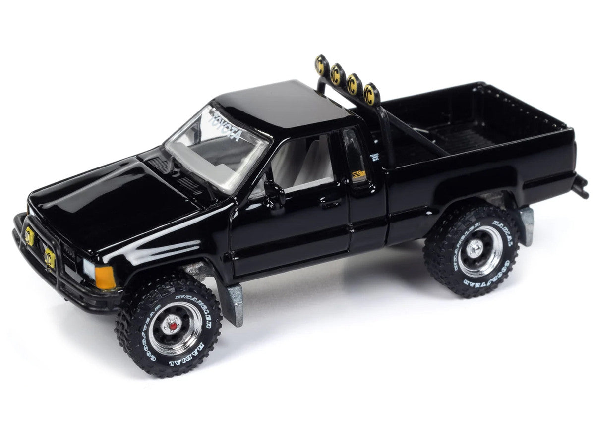 1985 Toyota SR5 Pickup Truck Black "Mystery Matinee" Movie Pop Culture 2024 Release 1 1/64 Diecast Model Car by Johnny Lightning LuxuryLifeWay Online Store