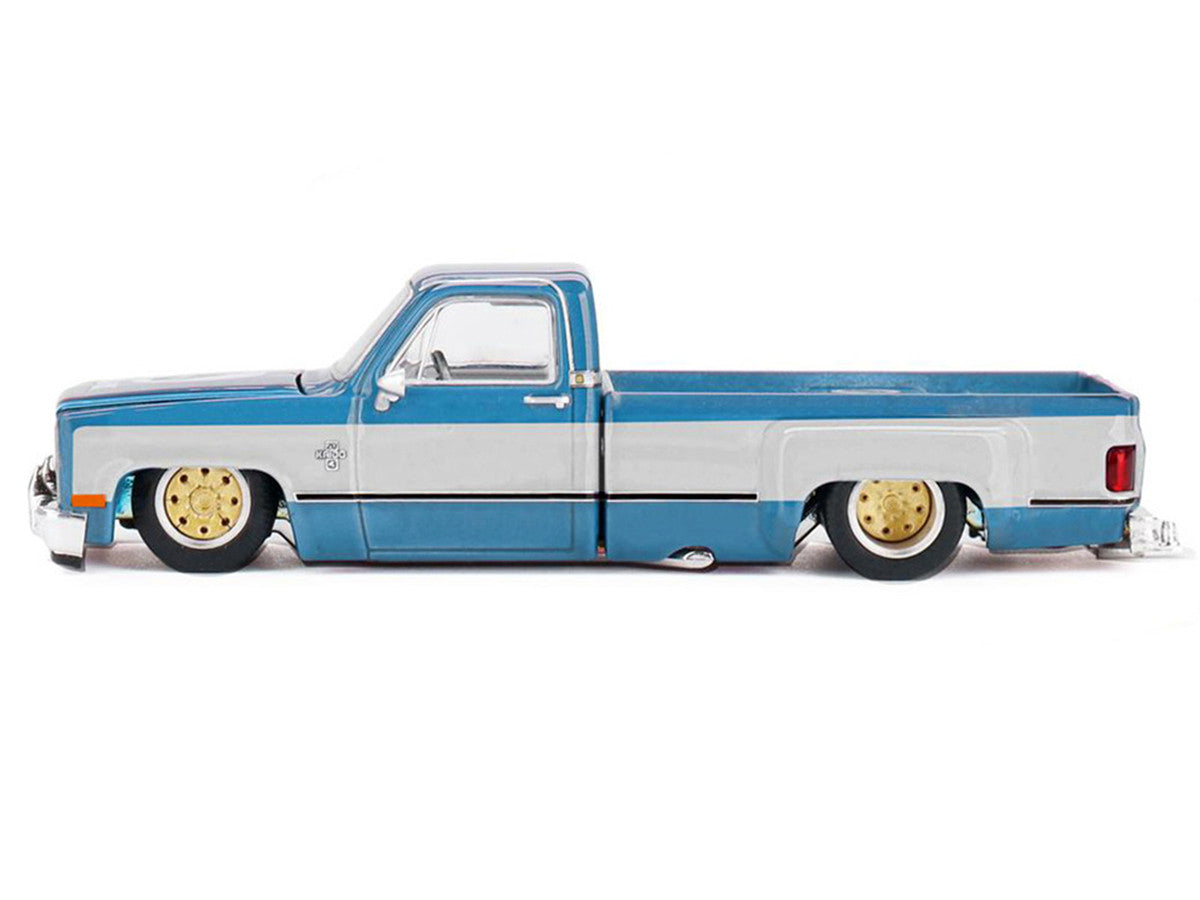 Chevrolet Silverado Dually Pickup Truck "Vintage Spec V1" Light Blue Metallic with White Sides and Interior (Designed by Jun Imai) "Kaido House" Special 1/64 Diecast Model Car by Mini GT LuxuryLifeWay Online Store