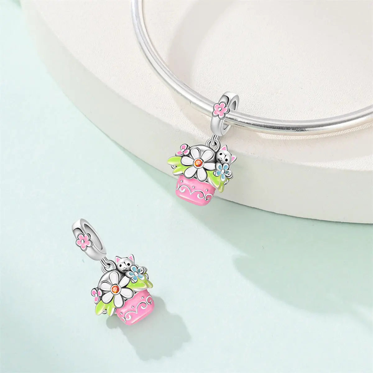 Attractive pendant featuring an animal - a baby elephant, a cat, a swan. Beaded DIY jewelry for a bracelet accessory. Pi-Mart