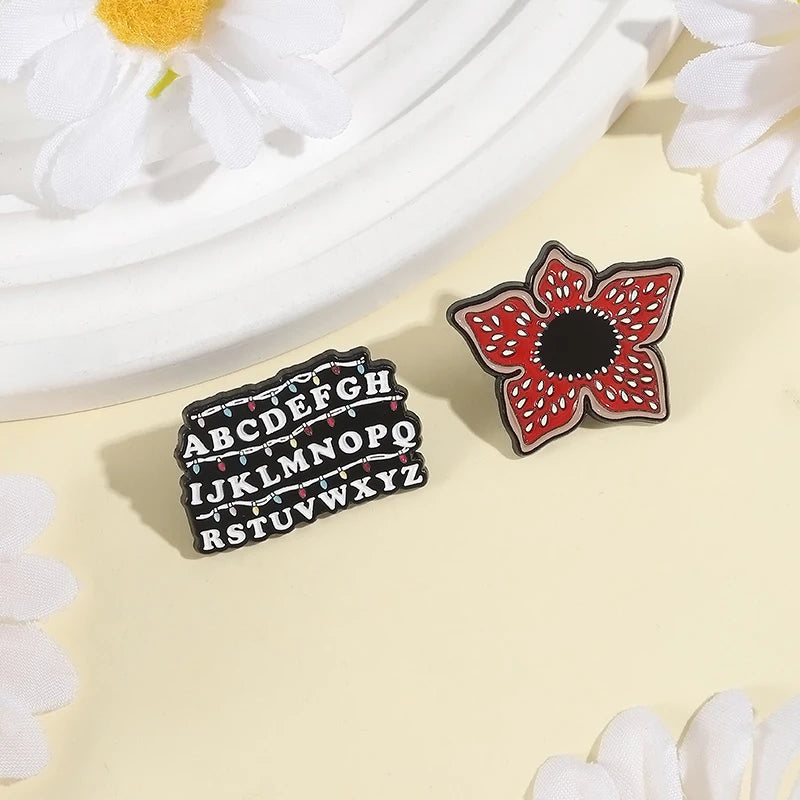 Sci-fi Horror Movies Brooch Enamel Pins Red Cannibal Flowers And 26 English Letter Brooches Backpack Lapel Badge Jewelry Gifts Pi-Mart