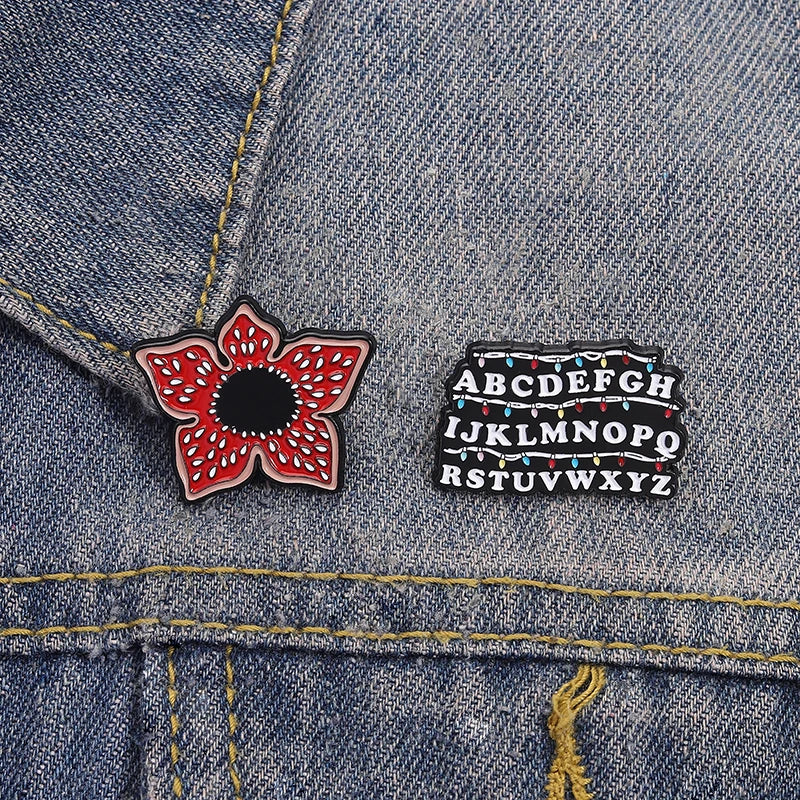 Sci-fi Horror Movies Brooch Enamel Pins Red Cannibal Flowers And 26 English Letter Brooches Backpack Lapel Badge Jewelry Gifts Pi-Mart