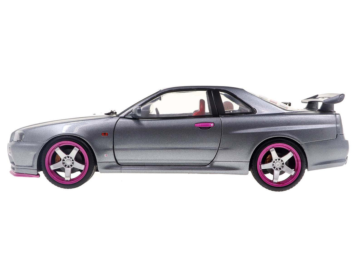 1999 Nissan Skyline GT-R (R34) RHD (Right Hand Drive) Silver Metallic with Purple Wheels 1/18 Diecast Model Car by Solido LuxuryLifeWay Online Store
