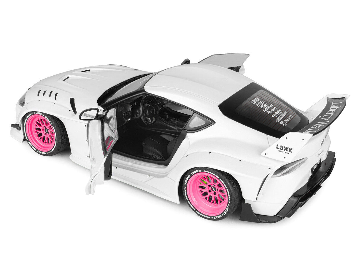 2025 Toyota GR Supra "Liberty Walk" Body Kit White Metallic with Pink Wheels 1/18 Diecast Model Car by Solido LuxuryLifeWay Online Store