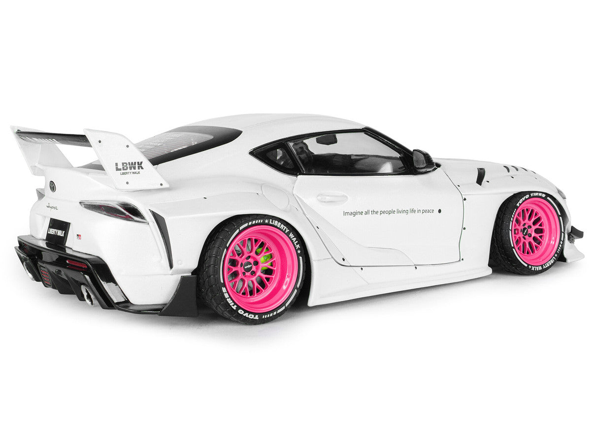 2025 Toyota GR Supra "Liberty Walk" Body Kit White Metallic with Pink Wheels 1/18 Diecast Model Car by Solido LuxuryLifeWay Online Store