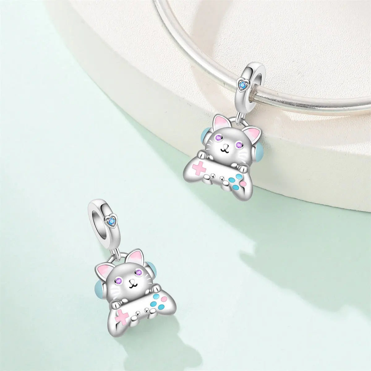 Attractive pendant featuring an animal - a baby elephant, a cat, a swan. Beaded DIY jewelry for a bracelet accessory. Pi-Mart