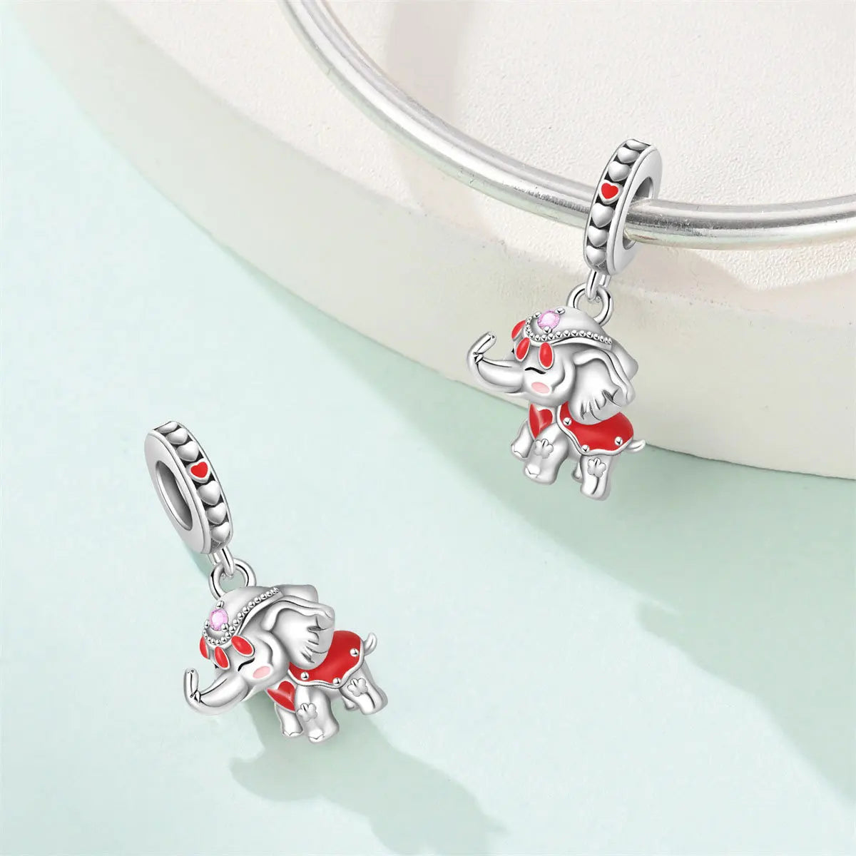 Attractive pendant featuring an animal - a baby elephant, a cat, a swan. Beaded DIY jewelry for a bracelet accessory. Pi-Mart