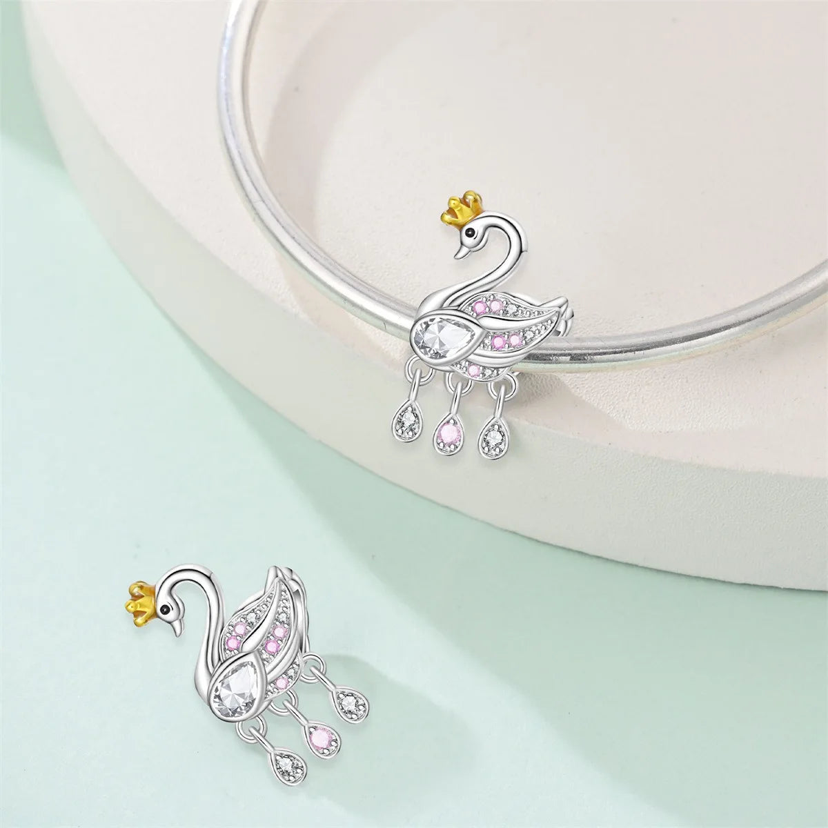 Attractive pendant featuring an animal - a baby elephant, a cat, a swan. Beaded DIY jewelry for a bracelet accessory. Pi-Mart
