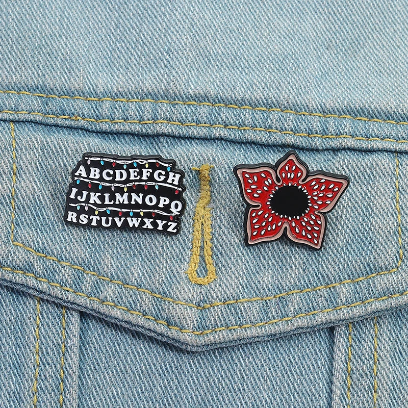 Sci-fi Horror Movies Brooch Enamel Pins Red Cannibal Flowers And 26 English Letter Brooches Backpack Lapel Badge Jewelry Gifts Pi-Mart