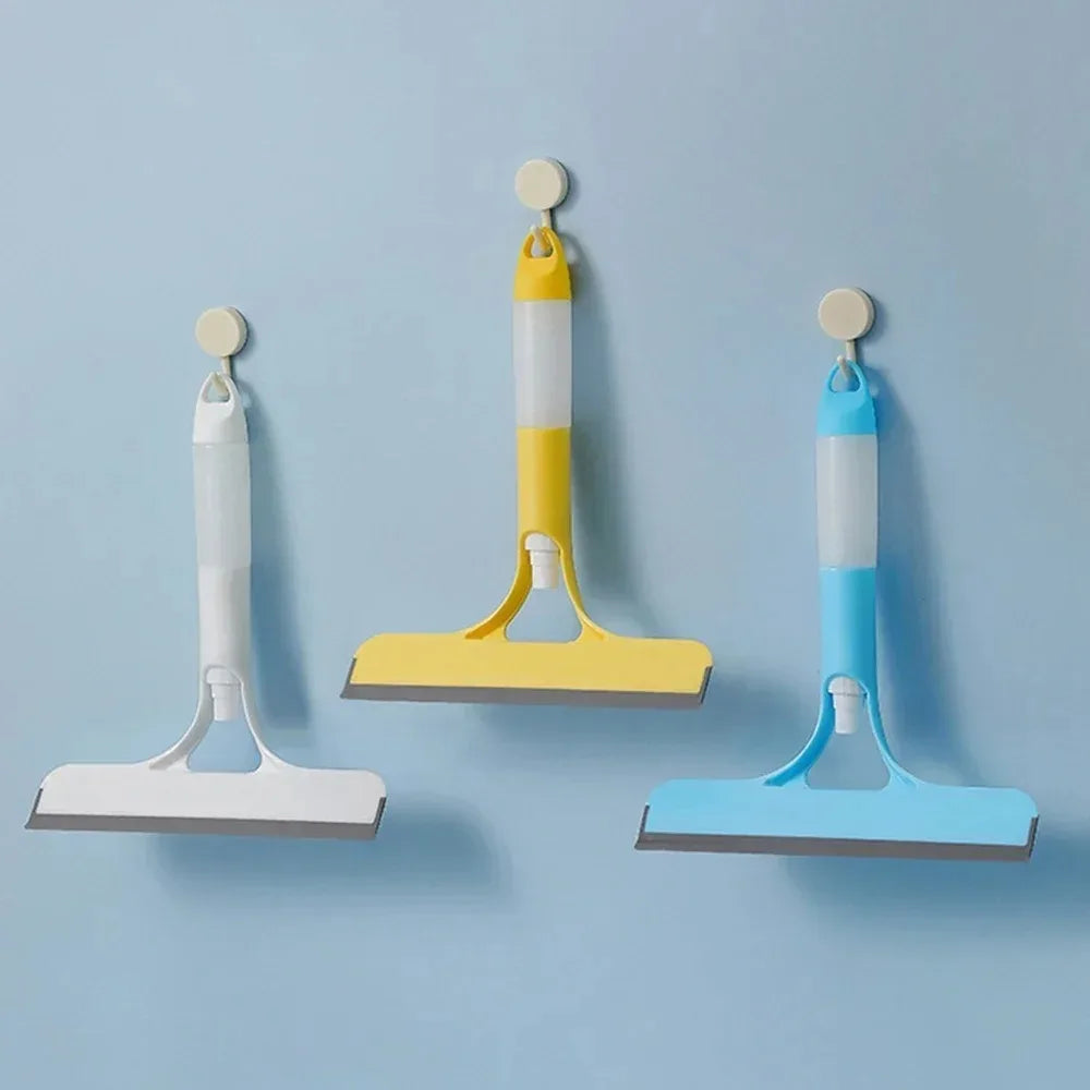 A household glass cleaning scraper that combines the functions of a watering can and a window scraper. Pi-Mart