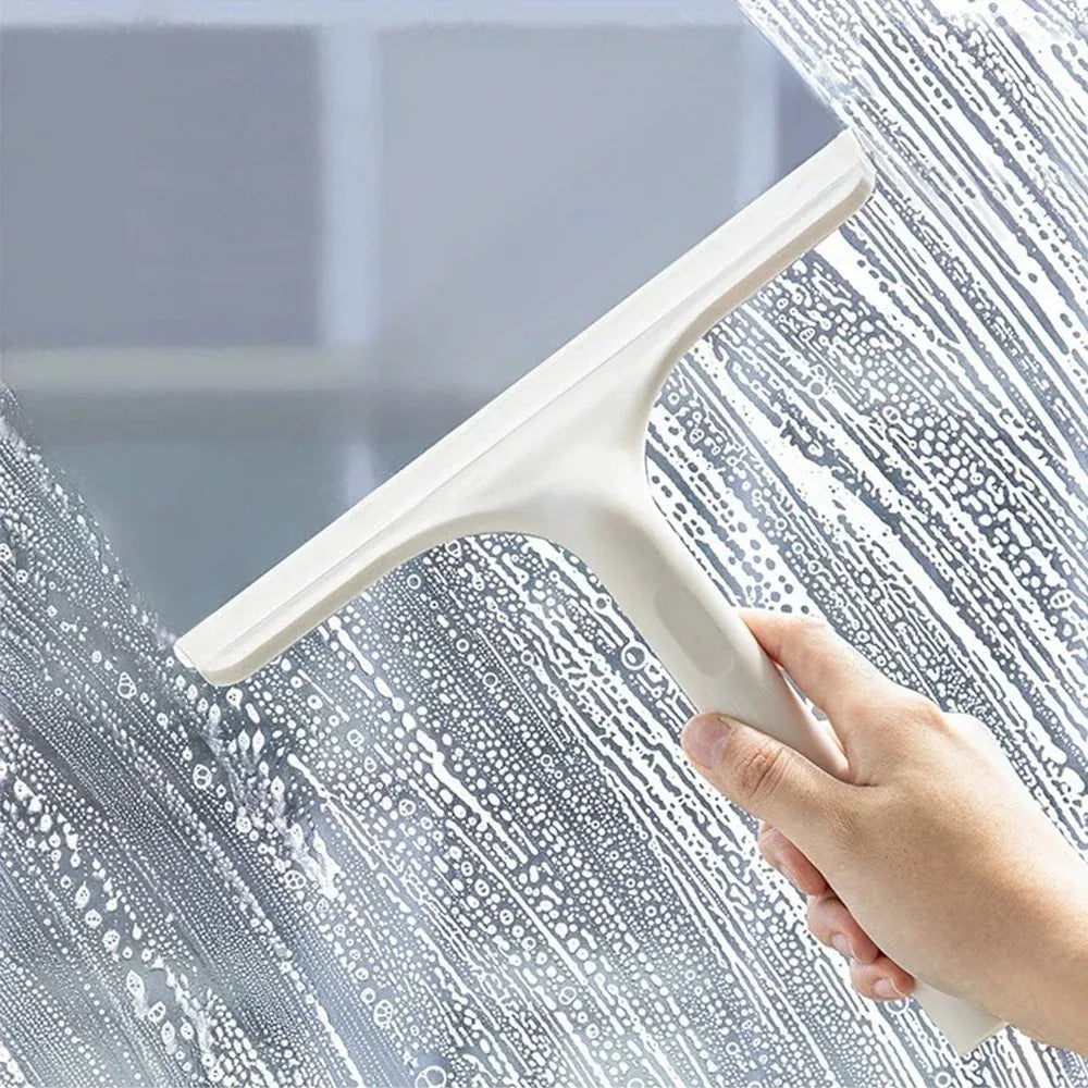 A household glass cleaning scraper that combines the functions of a watering can and a window scraper. Pi-Mart