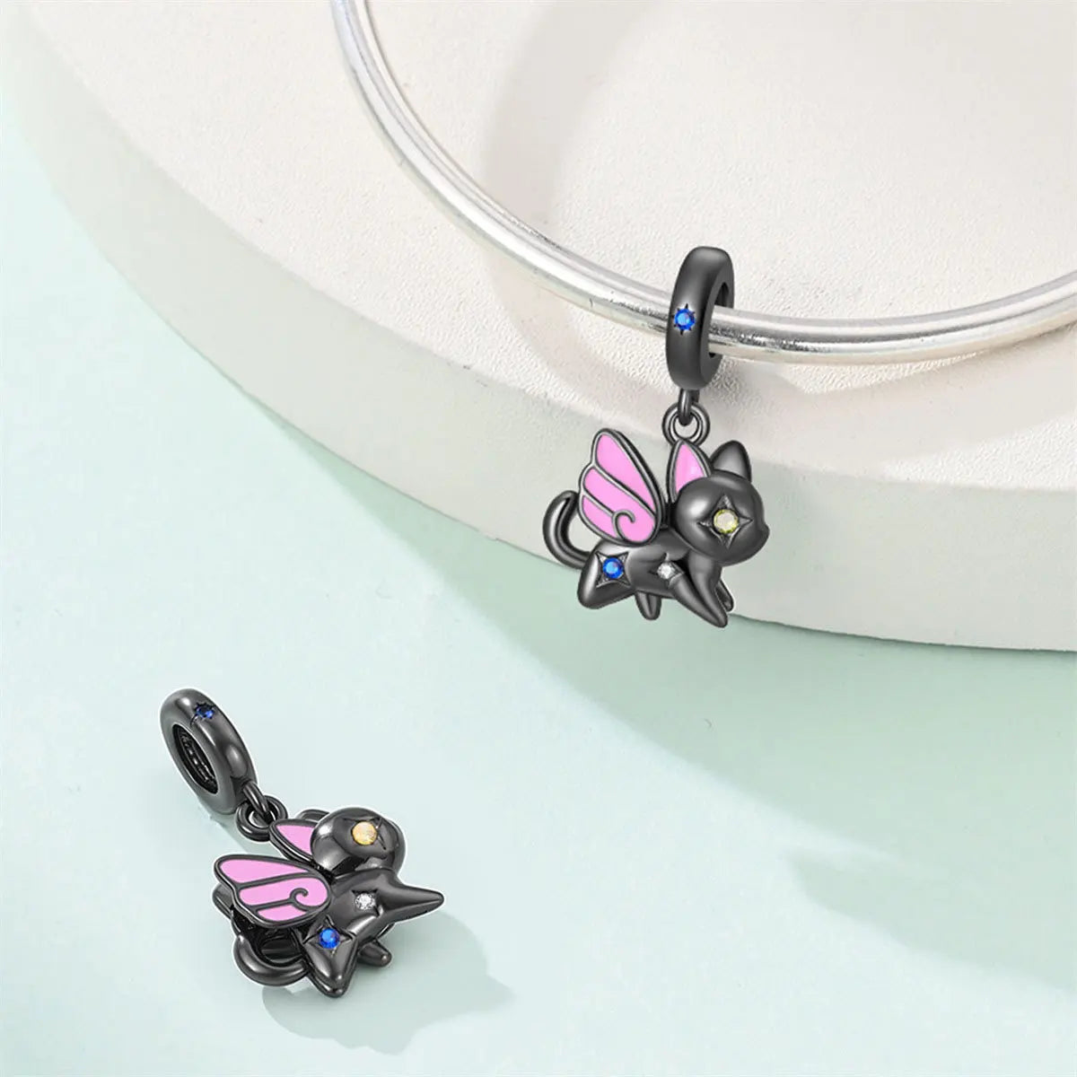 Attractive pendant featuring an animal - a baby elephant, a cat, a swan. Beaded DIY jewelry for a bracelet accessory. Pi-Mart