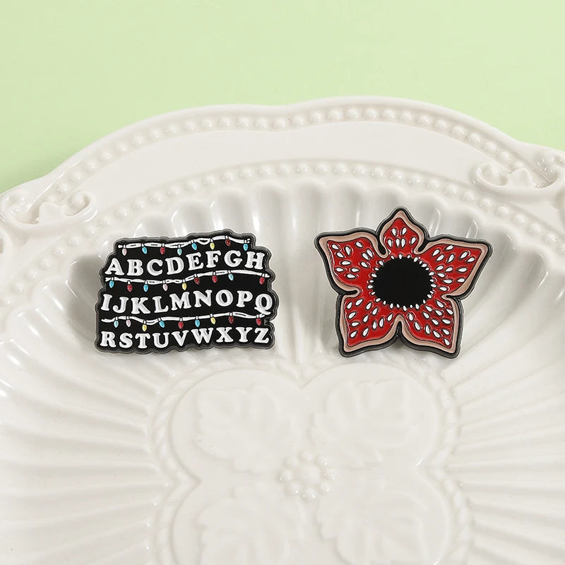 Sci-fi Horror Movies Brooch Enamel Pins Red Cannibal Flowers And 26 English Letter Brooches Backpack Lapel Badge Jewelry Gifts Pi-Mart
