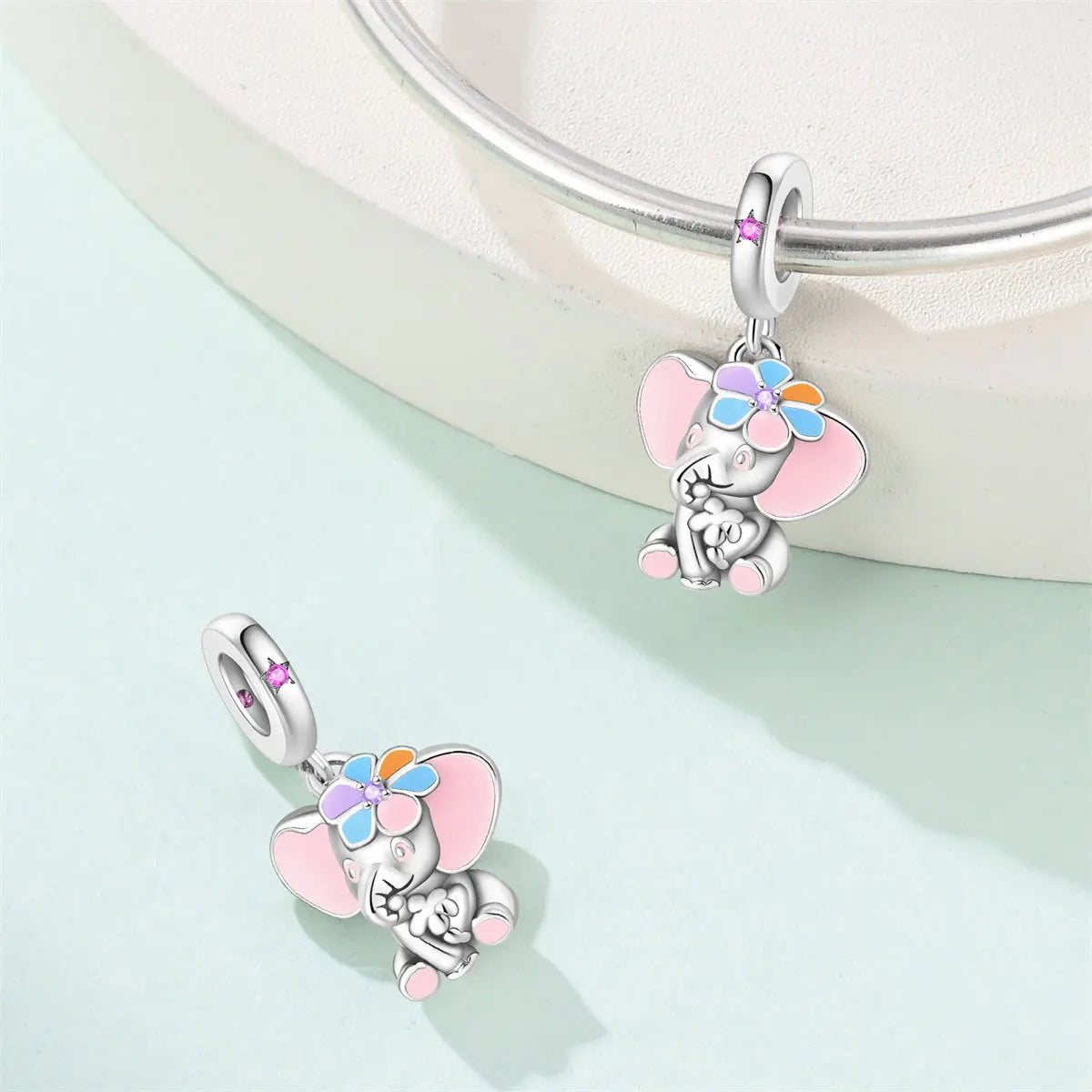 Attractive pendant featuring an animal - a baby elephant, a cat, a swan. Beaded DIY jewelry for a bracelet accessory. Pi-Mart