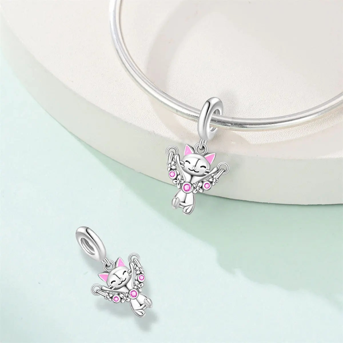 Attractive pendant featuring an animal - a baby elephant, a cat, a swan. Beaded DIY jewelry for a bracelet accessory. Pi-Mart