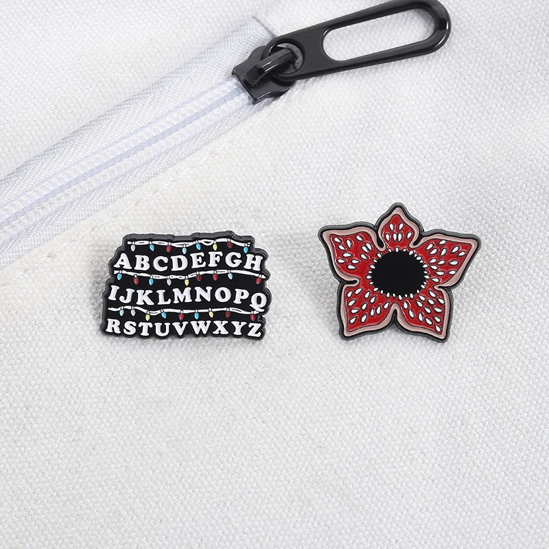 Sci-fi Horror Movies Brooch Enamel Pins Red Cannibal Flowers And 26 English Letter Brooches Backpack Lapel Badge Jewelry Gifts Pi-Mart