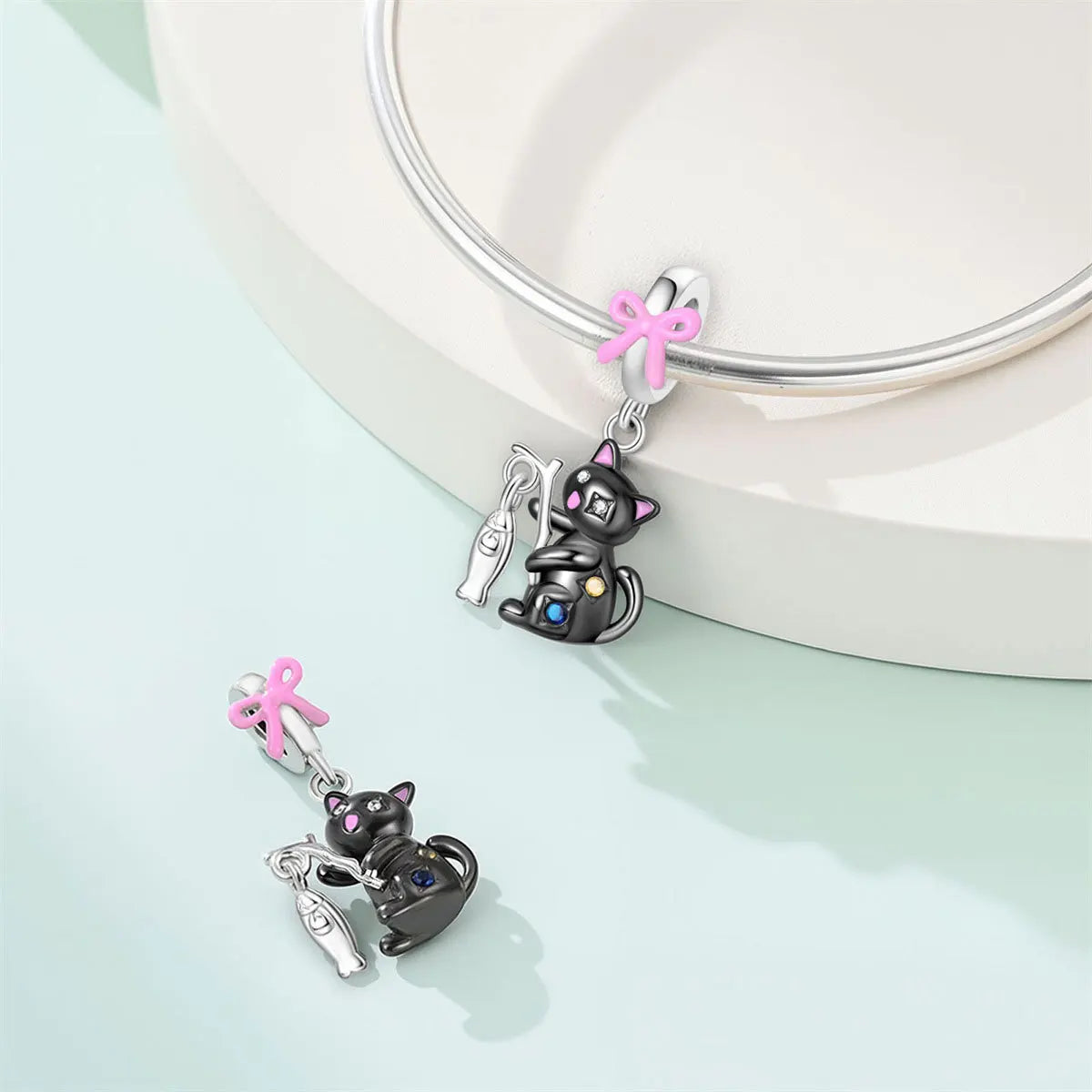 Attractive pendant featuring an animal - a baby elephant, a cat, a swan. Beaded DIY jewelry for a bracelet accessory. Pi-Mart