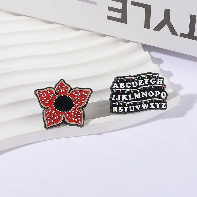 Sci-fi Horror Movies Brooch Enamel Pins Red Cannibal Flowers And 26 English Letter Brooches Backpack Lapel Badge Jewelry Gifts Pi-Mart