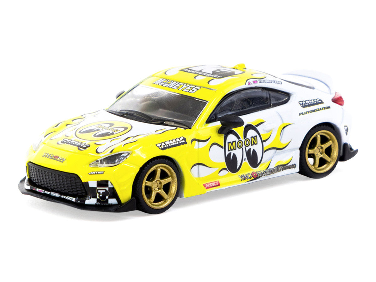 Toyota GR86 RHD (Right Hand Drive) "MoonEyes" White with Yellow Flames and Graphics "Global64" Series 1/64 Diecast Model by Tarmac Works LuxuryLifeWay Online Store