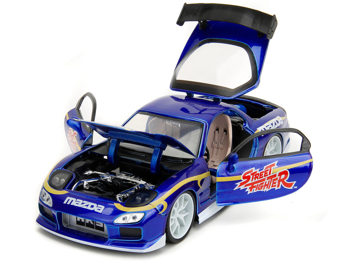 1993 Mazda RX-7 Candy Blue Metallic with Graphics and Chun-Li Diecast Figure "Street Fighter" Video Game "Anime Hollywood Rides" Series 1/24 Diecast Model Car by Jada LuxuryLifeWay Online Store