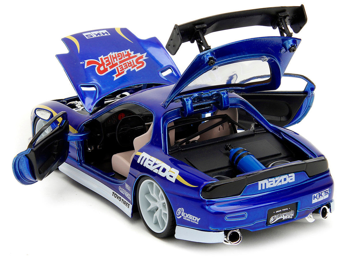 1993 Mazda RX-7 Candy Blue Metallic with Graphics and Chun-Li Diecast Figure "Street Fighter" Video Game "Anime Hollywood Rides" Series 1/24 Diecast Model Car by Jada LuxuryLifeWay Online Store