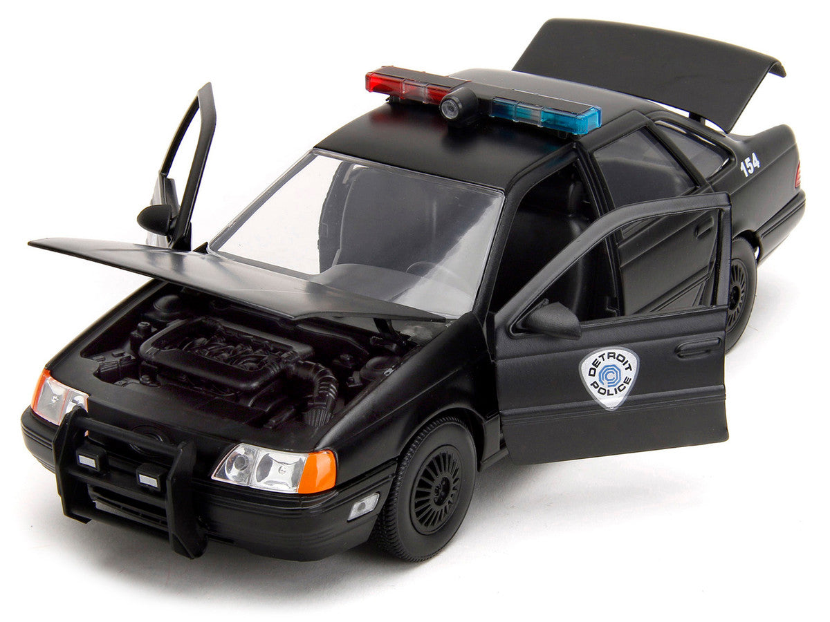 Ford Taurus OCP Matt Black "Detroit Police" and Robocop Diecast Figure 35th Anniversary "Robocop" (1987) Movie "Hollywood Rides" Series 1/24 Diecast Model Car by Jada LuxuryLifeWay Online Store
