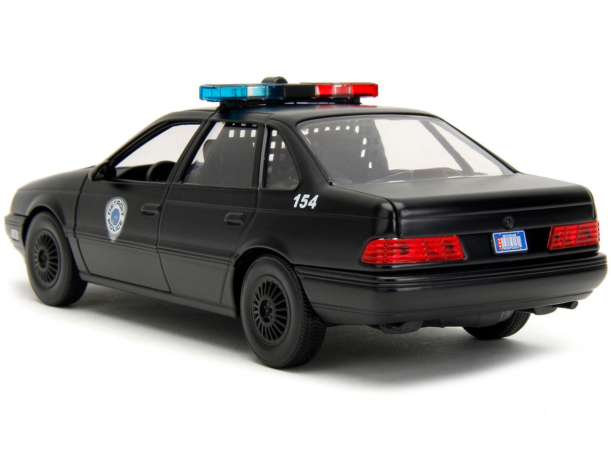Ford Taurus OCP Matt Black "Detroit Police" and Robocop Diecast Figure 35th Anniversary "Robocop" (1987) Movie "Hollywood Rides" Series 1/24 Diecast Model Car by Jada LuxuryLifeWay Online Store