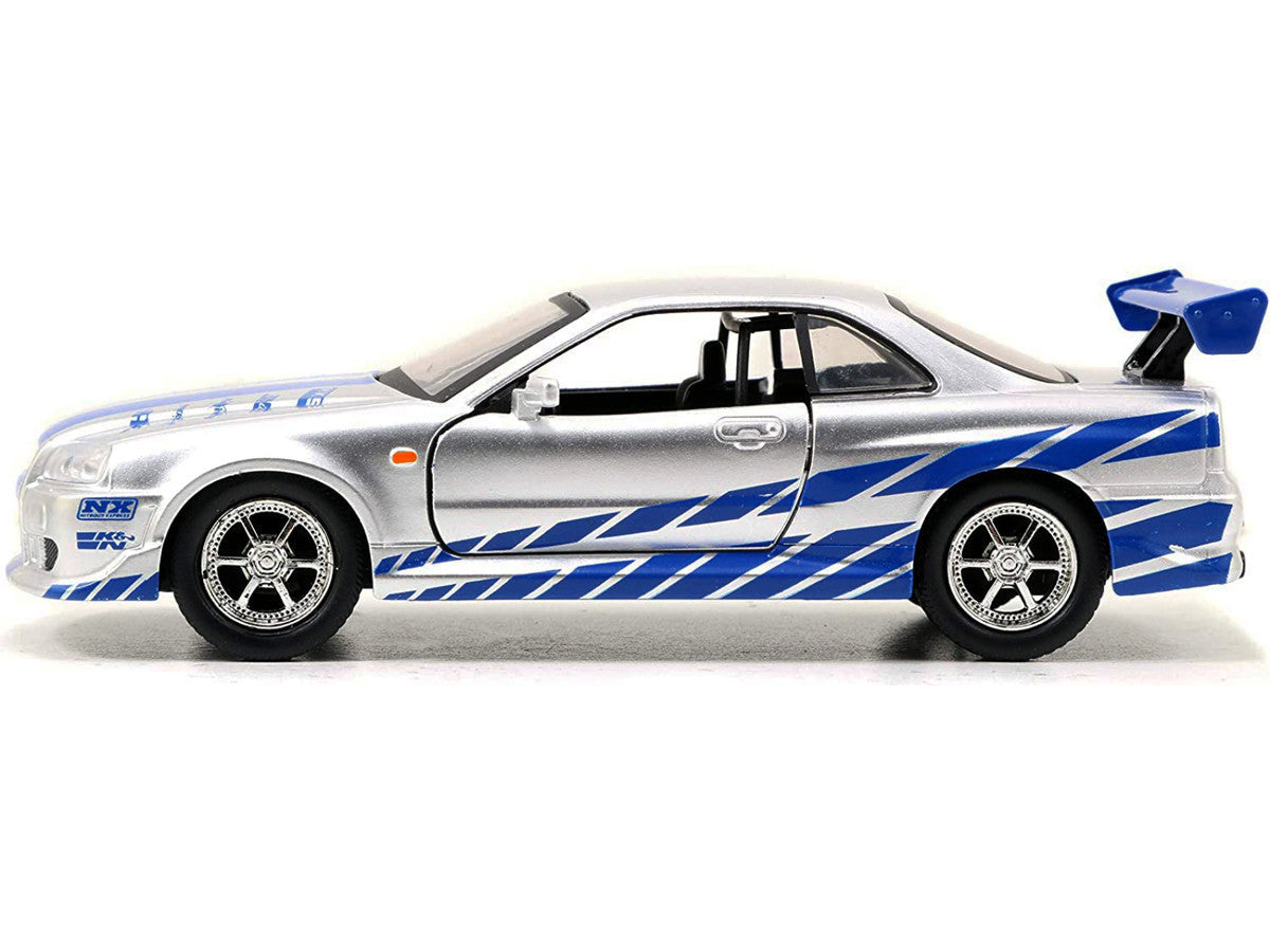Brian's Nissan Skyline GT-R (R34) RHD (Right Hand Drive) Silver Metallic with Blue Stripes "2 Fast 2 Furious" (2003) Movie "Fast & Furious 25th Anniversary" Series 1/32 Diecast Car Model by Jada LuxuryLifeWay Online Store