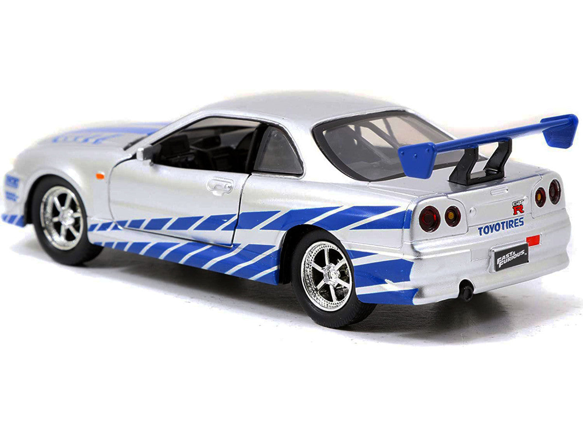 Brian's Nissan Skyline GT-R (R34) RHD (Right Hand Drive) Silver Metallic with Blue Stripes "2 Fast 2 Furious" (2003) Movie "Fast & Furious 25th Anniversary" Series 1/32 Diecast Car Model by Jada LuxuryLifeWay Online Store
