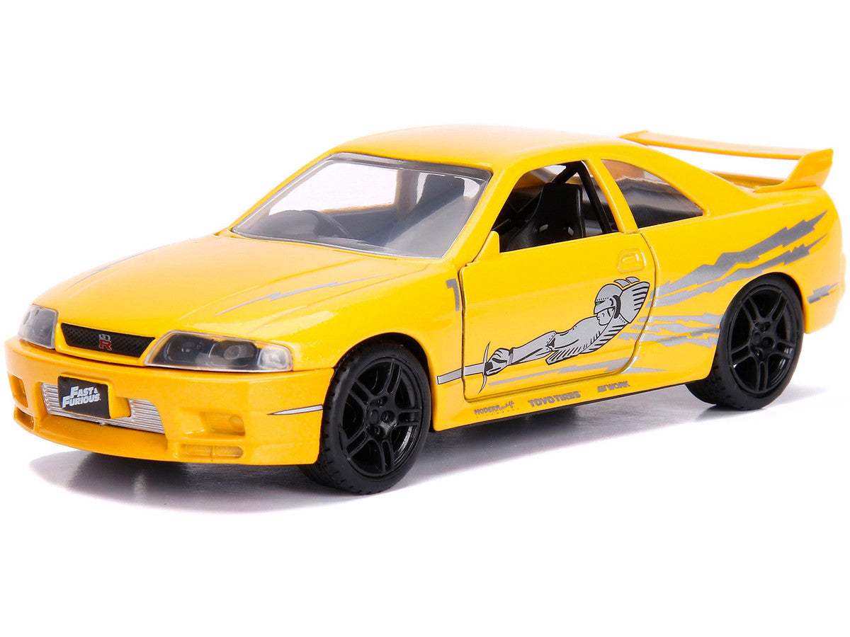 Leon's Nissan Skyline GT-R (BCNR33) Yellow Metallic with Graphics "Fast & Furious" Series 1/32 Diecast Model Car by Jada LuxuryLifeWay Online Store